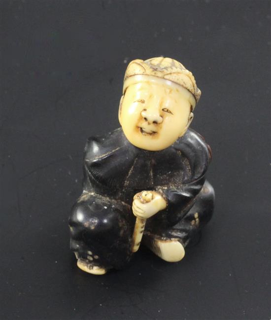 A Japanese wood, lacquer and ivory netsuke, Meiji period, 4.2cm